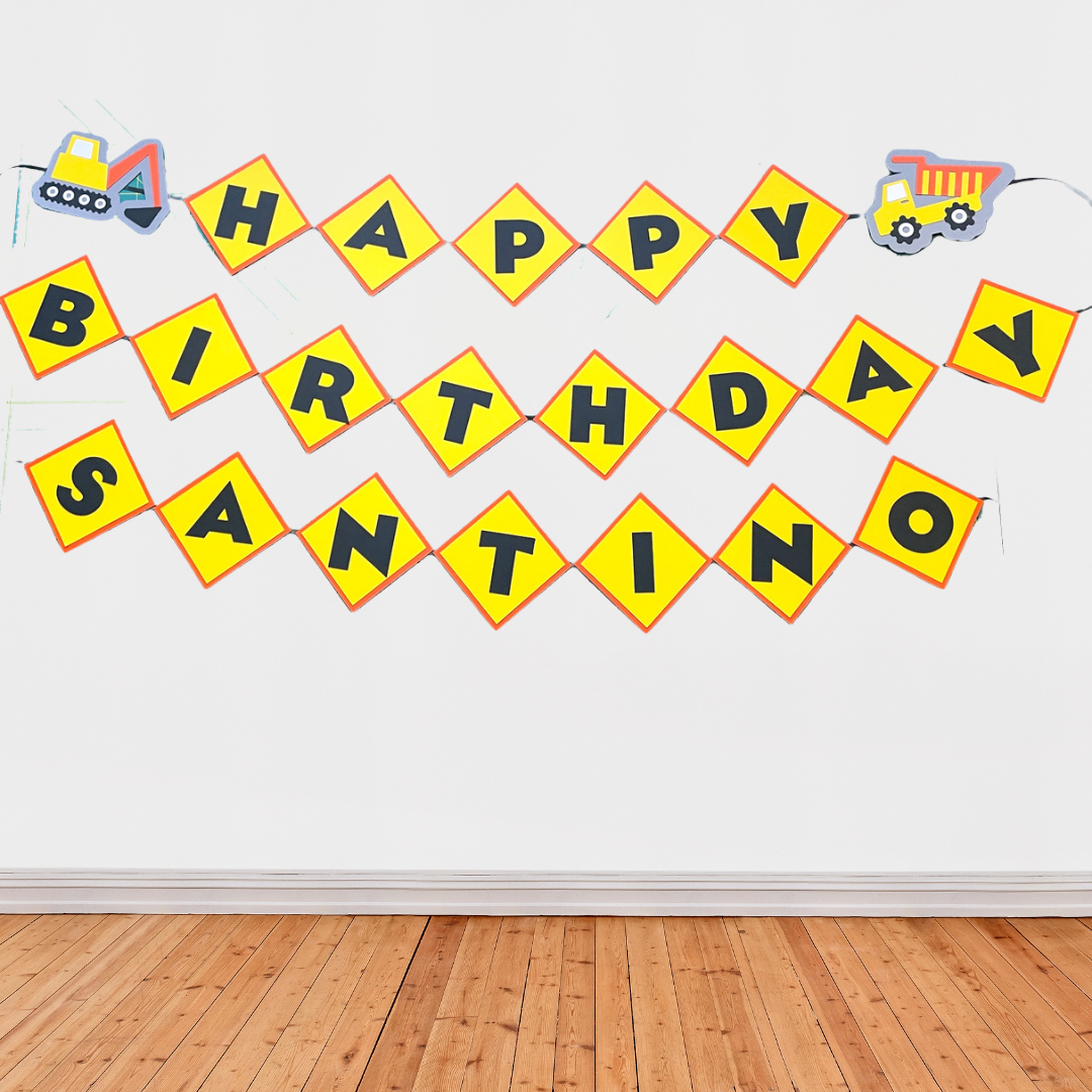 Orange and yellow construction themed birthday banner. Happy Birthday Santino with 2 construction trucks. all made of thick cardstock. 